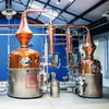 Distilleria di pentole in acciaio inossidabile con colonna di rame da 1000 litri in vendita